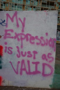 Graffiti that says "my expression is just as valid"